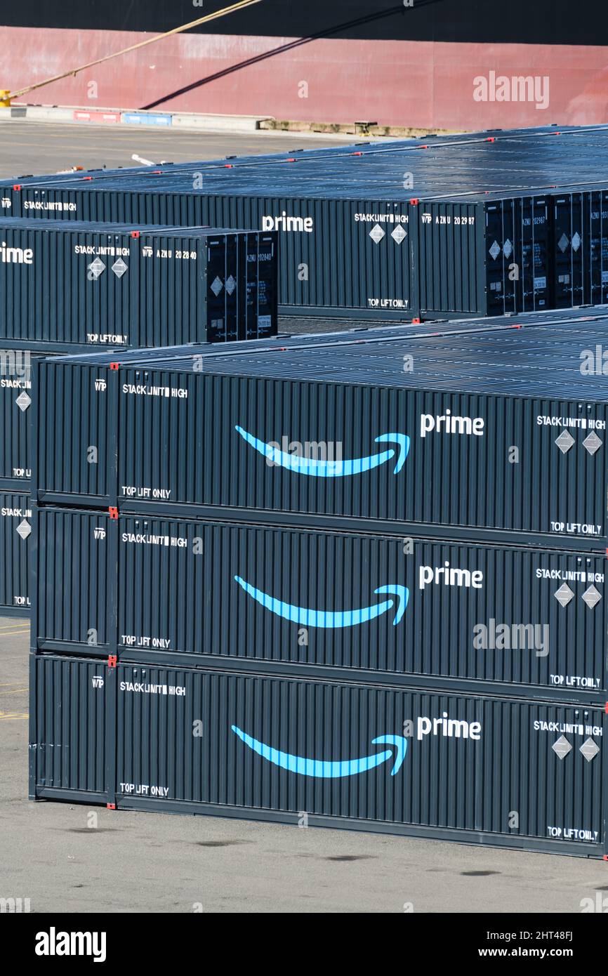 Everett, WA, USA - February 25, 2022; Stack of branded Amazon Prime intermodal shipping containers with company logo in stacks three high Stock Photo