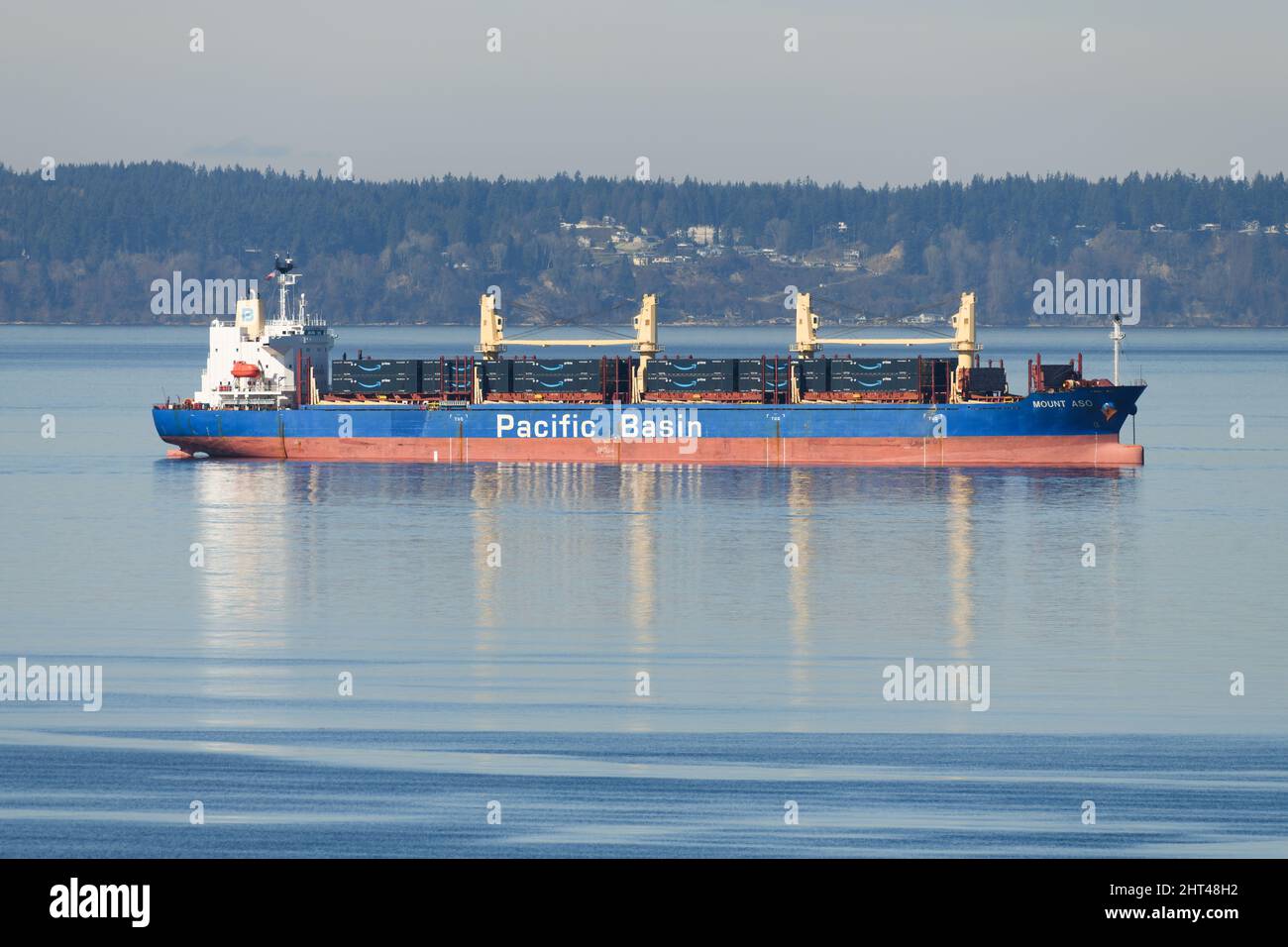 Everett, WA, USA - February 25, 2022; Mount Aso of the Pacific Basin Shipping HK LTD company with a cargo of Amazon Prime branded shipping containers Stock Photo