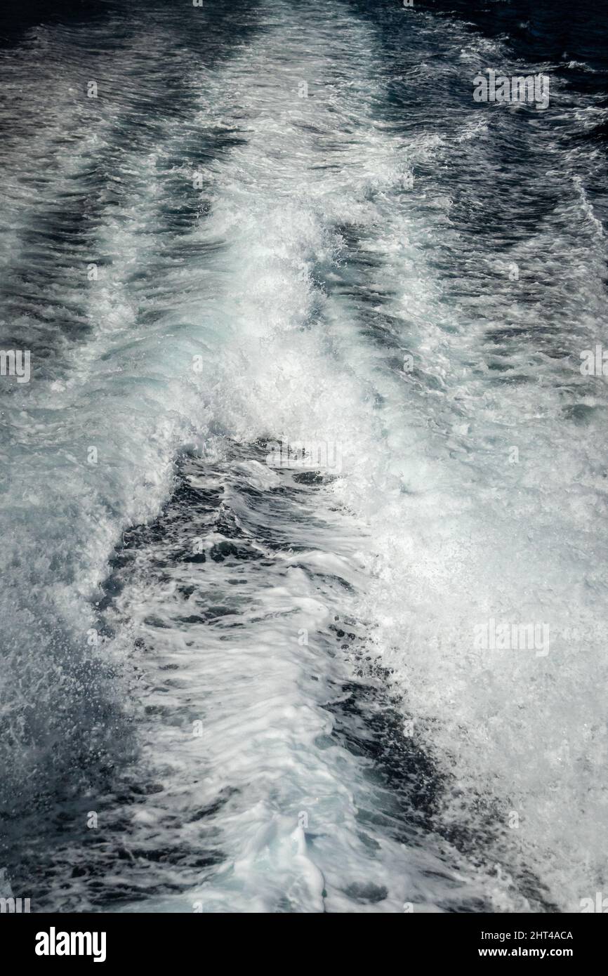 Vertical shot of the water in the back of speed boat Stock Photo - Alamy