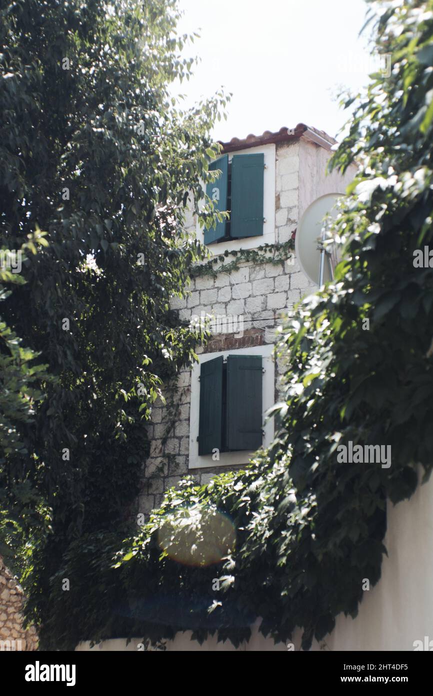 Vertical shot of narrow old street Stock Photo - Alamy
