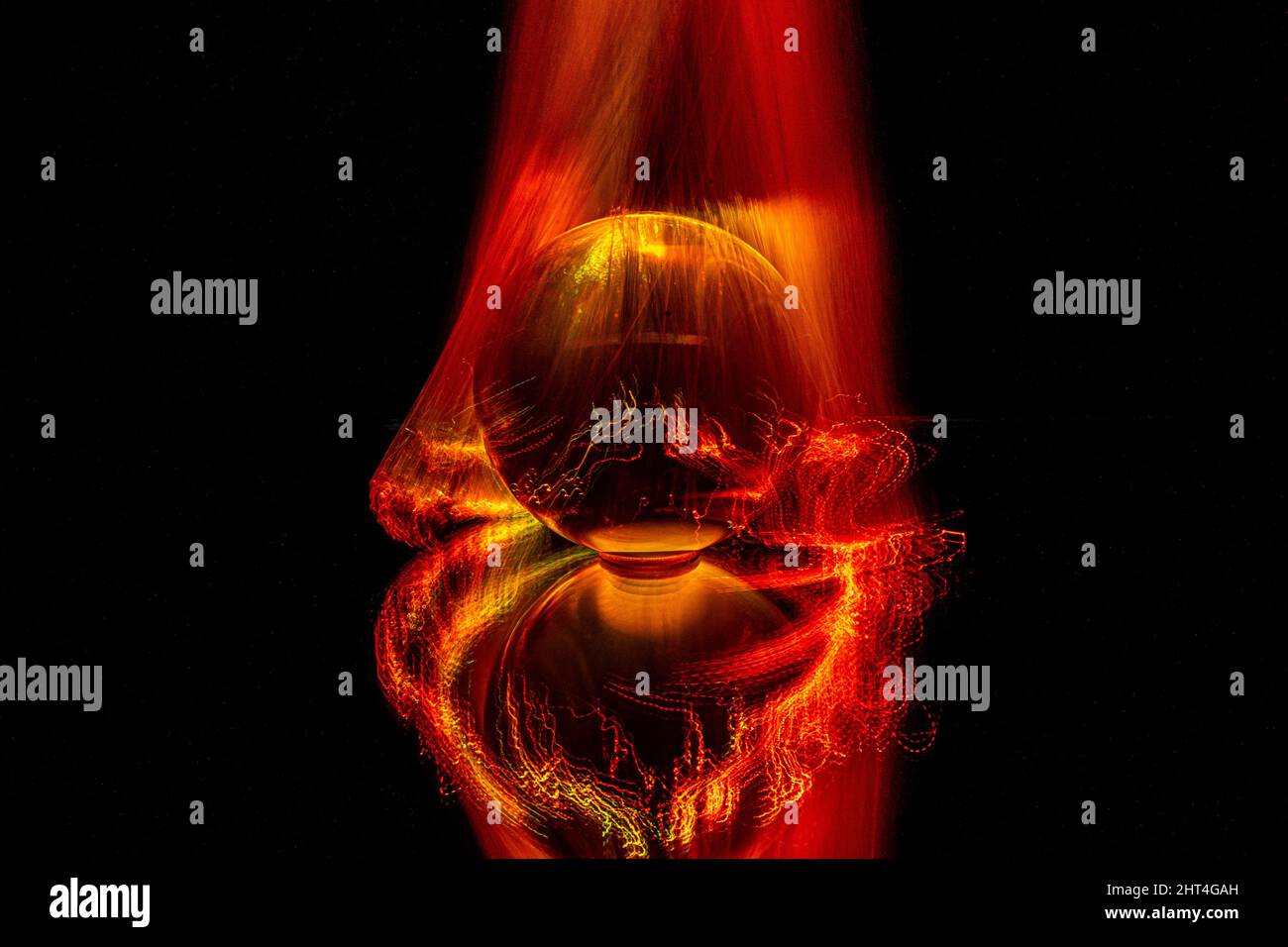 Closeup of a fireball on a dark background Stock Photo