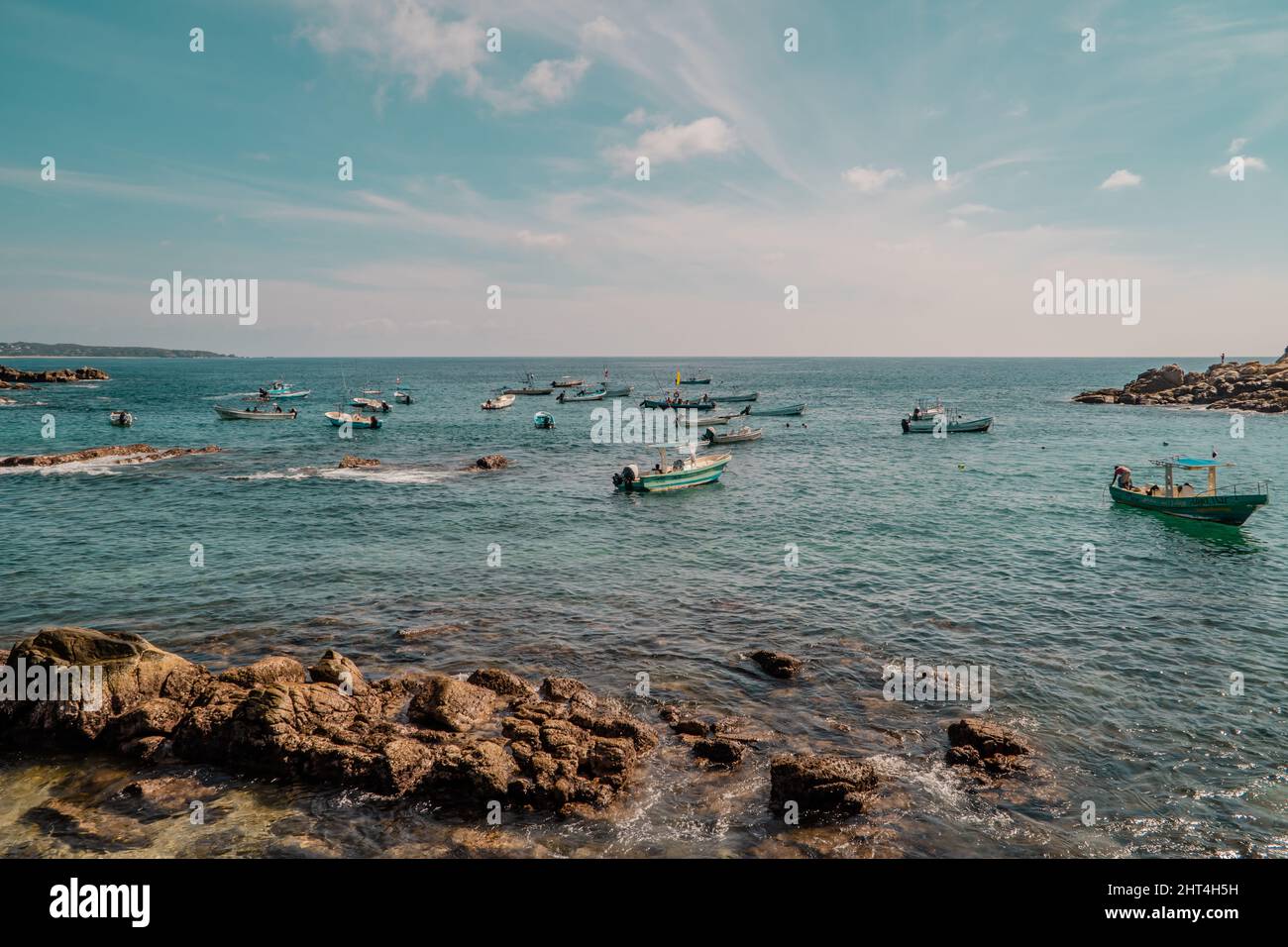 Boats in the sea near the shore. Playa Manzanillo beach in Puerto