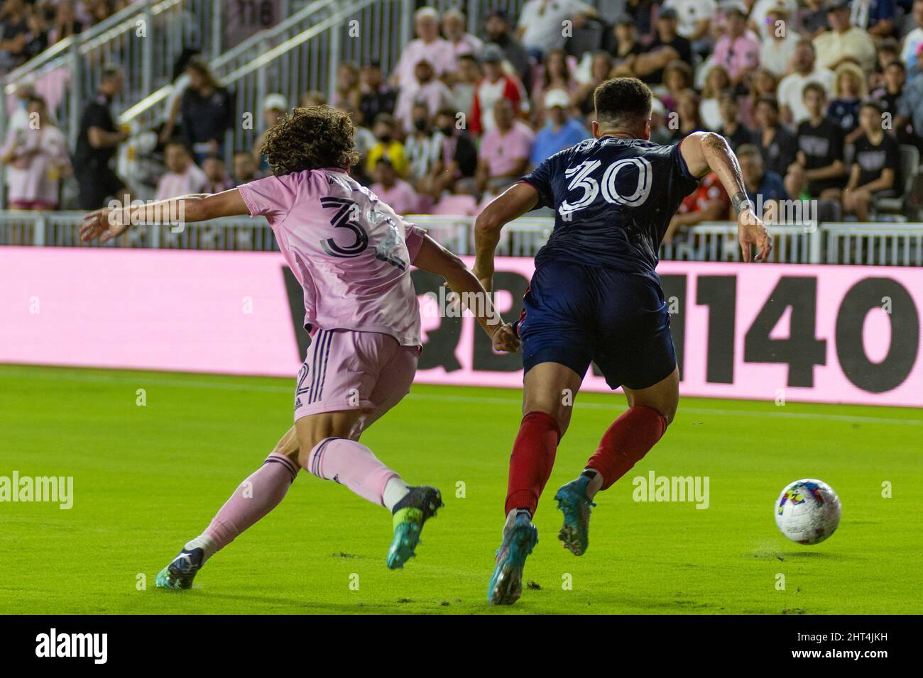 Fort Lauderdale, FL, USA. 26th Feb. 2022. 32 Noah Allen DF Inter Miami CF, 30 Gaston Gimenez MF Chicago Fire FC during soccer game between Inter Miami CF vs Chicago Fire FC, MLS 2022 season at DRV Pink Stadium. Credit: Yaroslav Sabitov/YES Market Media/Alamy Live News Stock Photo