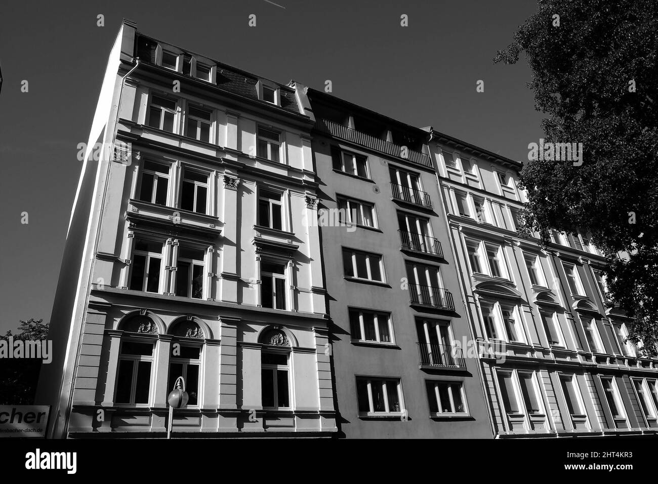 Grayscale of beautiful old apartment buildings in the sunshine in  Frankfurt am Main, Hesse Stock Photo