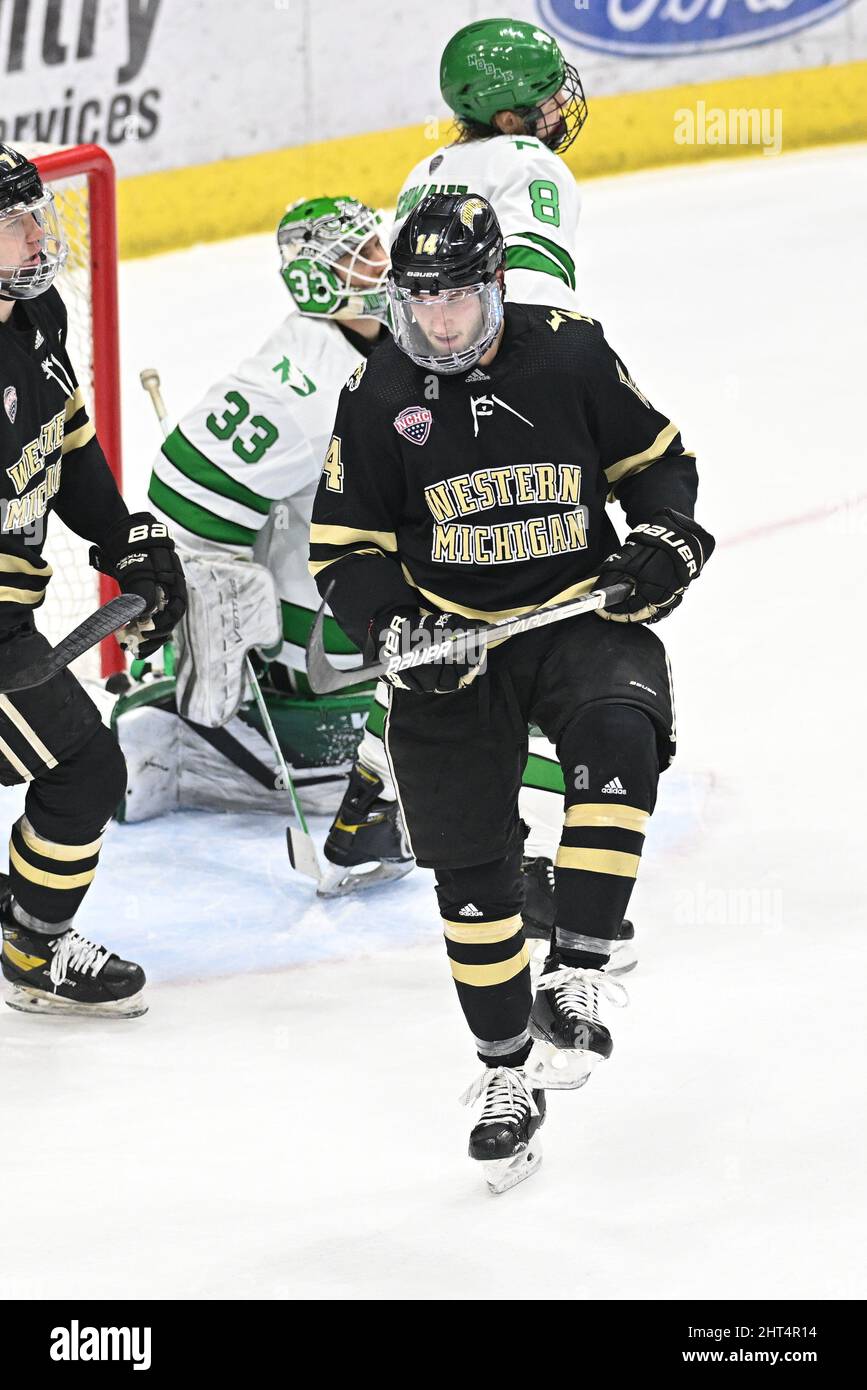 Western Michigan Broncos forward Jason Polin (14) celebrates after scoring a goal during a NCAA men's hockey game between the Western Michigan University Broncos and the University of North Dakota Fighting Hawks at Ralph Engelstad Arena in Grand Forks, ND on Saturday, Frebruary 26, 2022. By Russell Hons/CSM Stock Photo