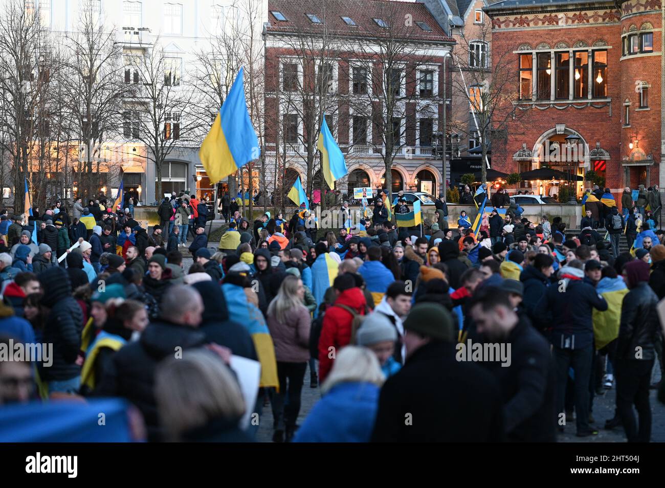Crowd of people protesting against the Russian invasion of Ukraine: Anti war protests demonstration in Aarhus, Denmark on 26 February 2022. Showing pe Stock Photo