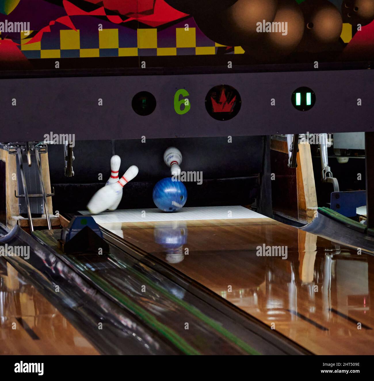 Photo of a bowling ball hitting bowling pins Stock Photo Alamy