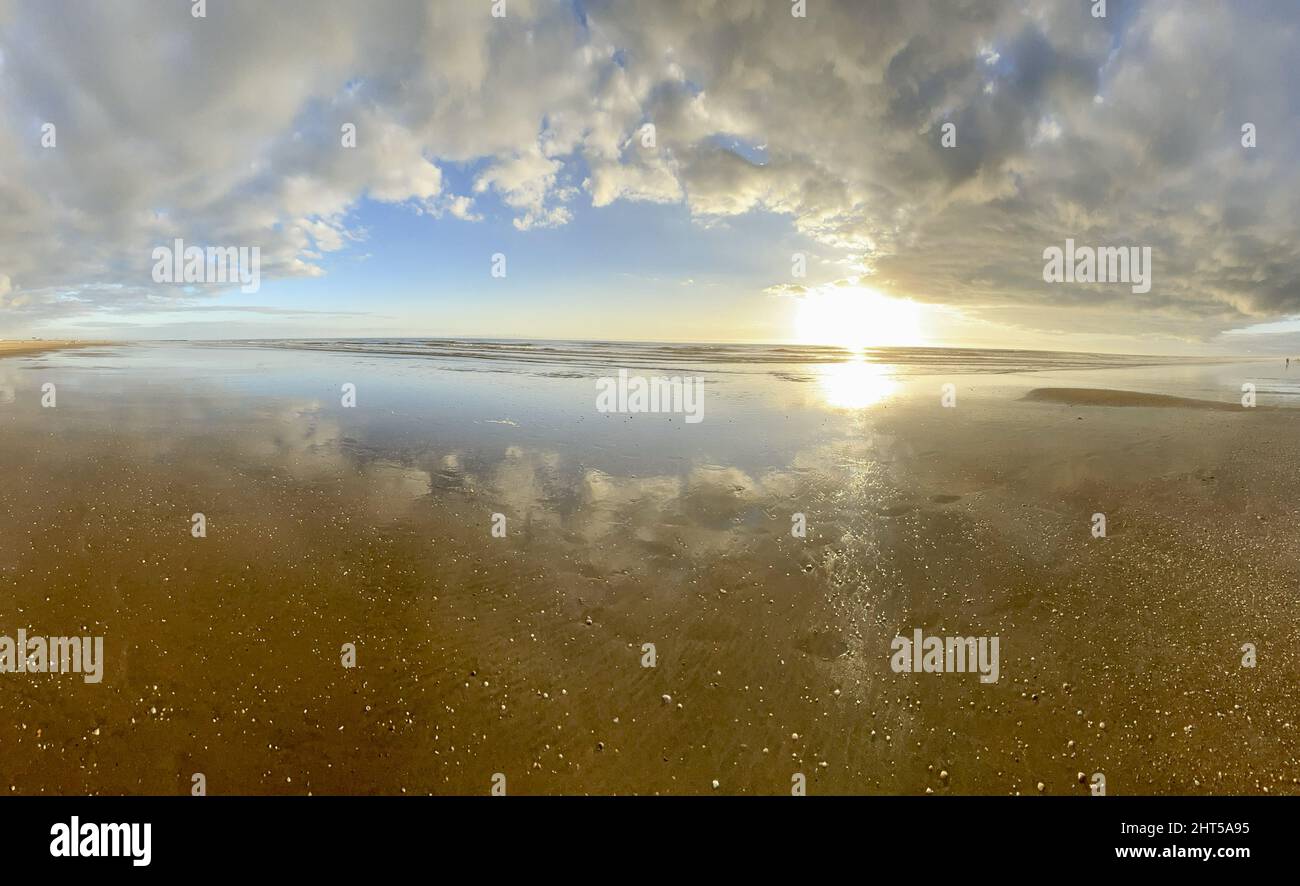 Closeup of a sky and its reflection in water Stock Photo - Alamy