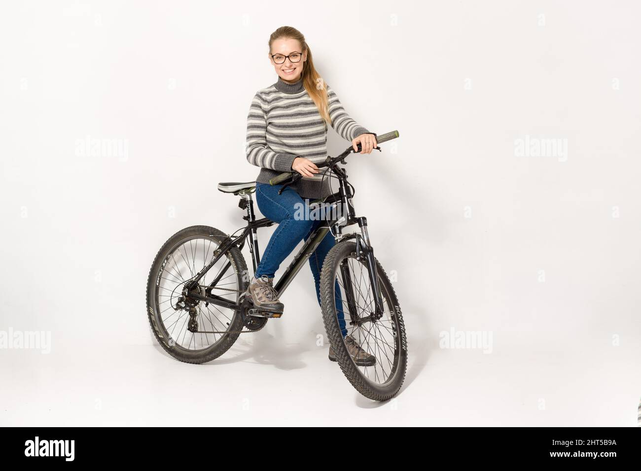 girl and a mountain bike TREK 