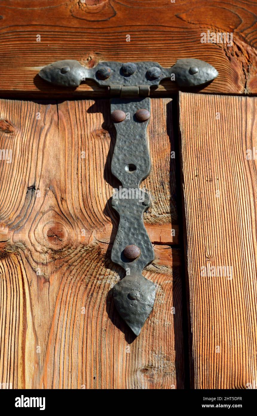Closeup of a rusty lock on a wooden door Stock Photo - Alamy