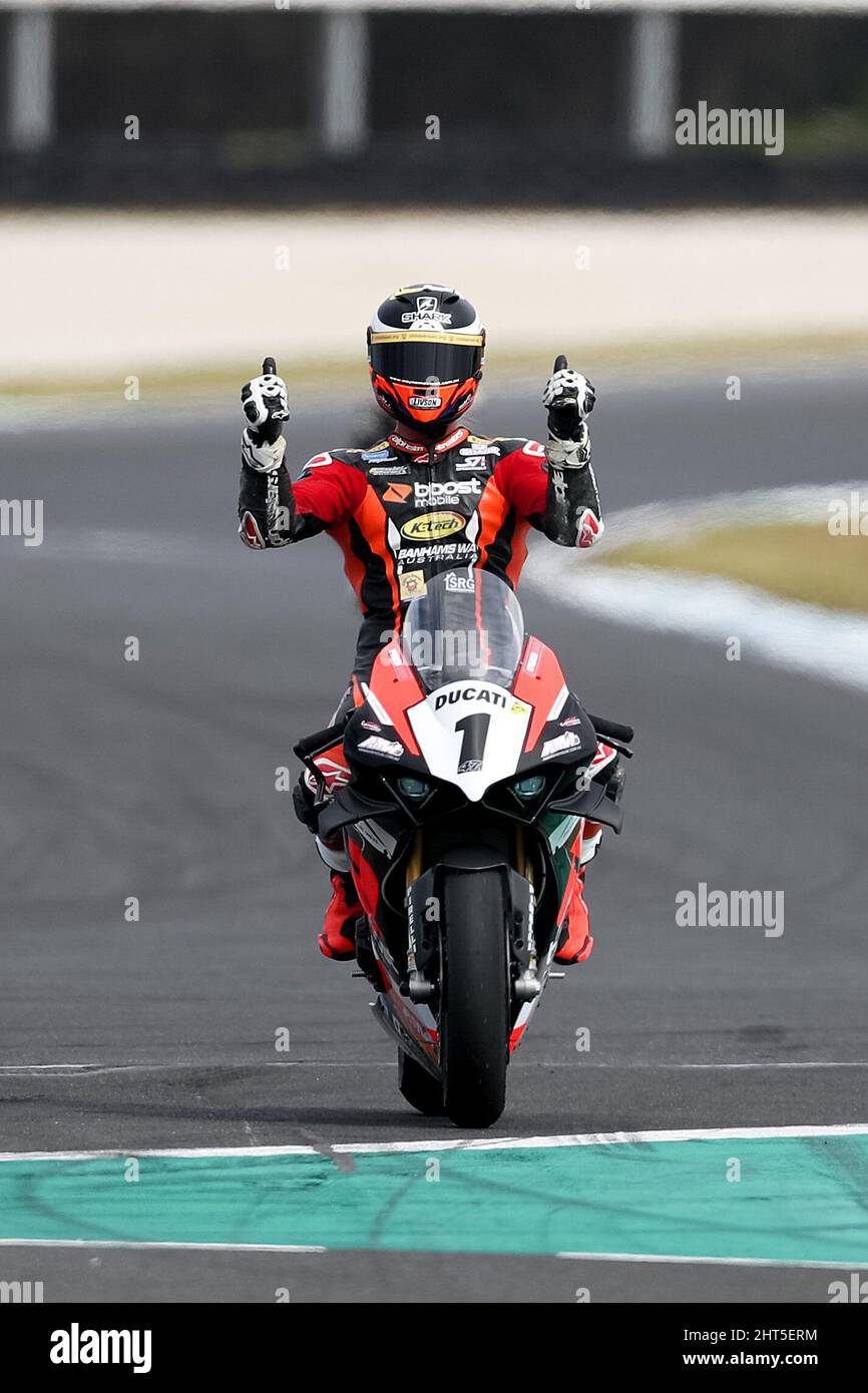 Melbourne, Australia, 27 February, 2022. Wayne Maxwell riding his Ducati V4-R 1000 racing for Boost Mobile Racing with K-Tech celebrates winning race two of the Australian Superbikes as part of the mi-bike Motorcycle Insurance Australian Superbike Championship. Credit: Brett Keating/Speed Media/Alamy Live News Stock Photo