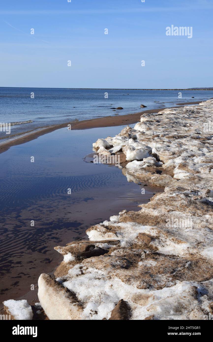 Vertical photo of salt rock formation on a sea shore Stock Photo Alamy