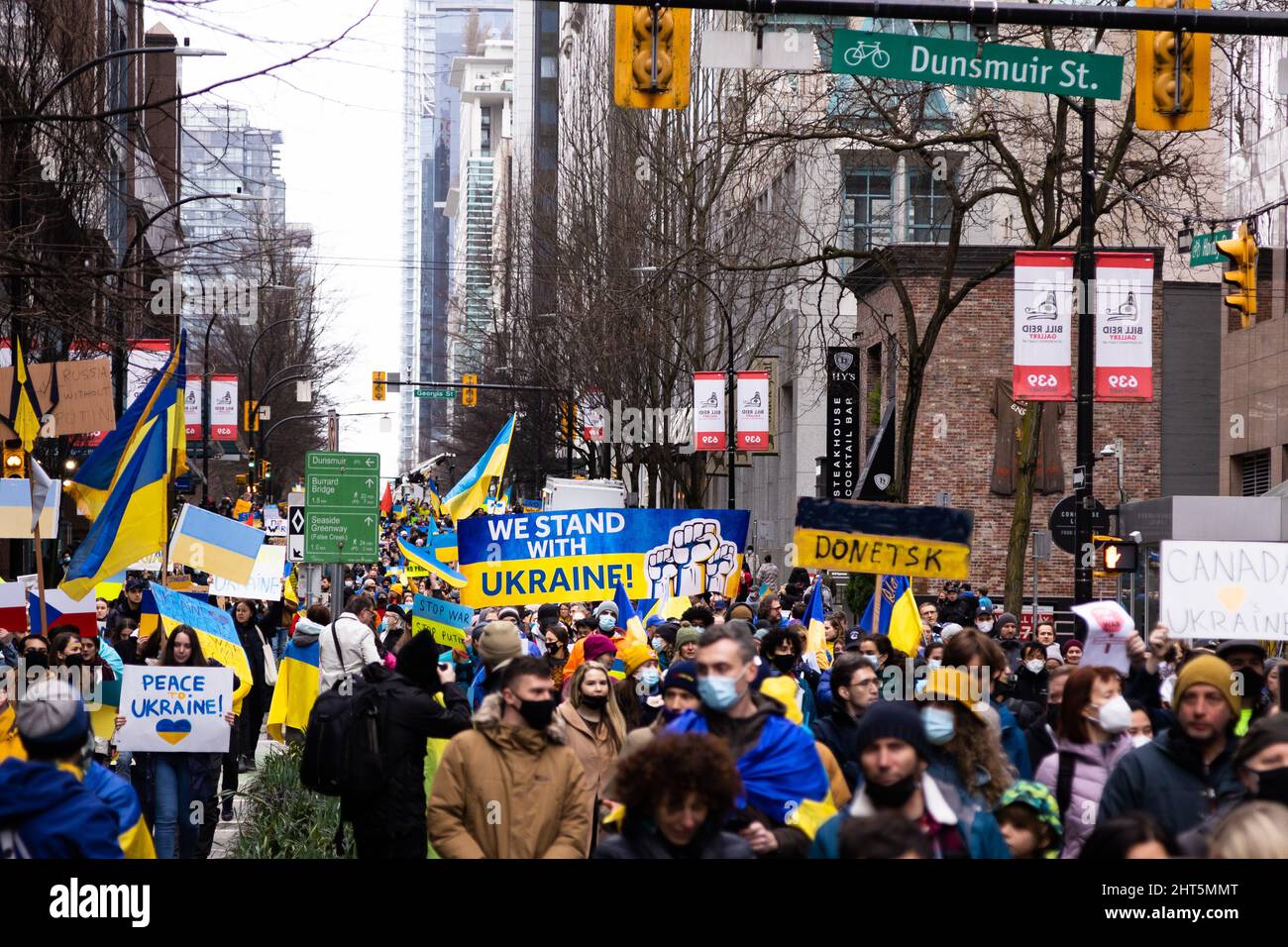 DOWNTOWN VANCOUVER, BC, CANADA - FEB 26, 2022: Protest rally against Vladimir Putin and the Russian invasion of Ukraine that was attended by thousands Stock Photo