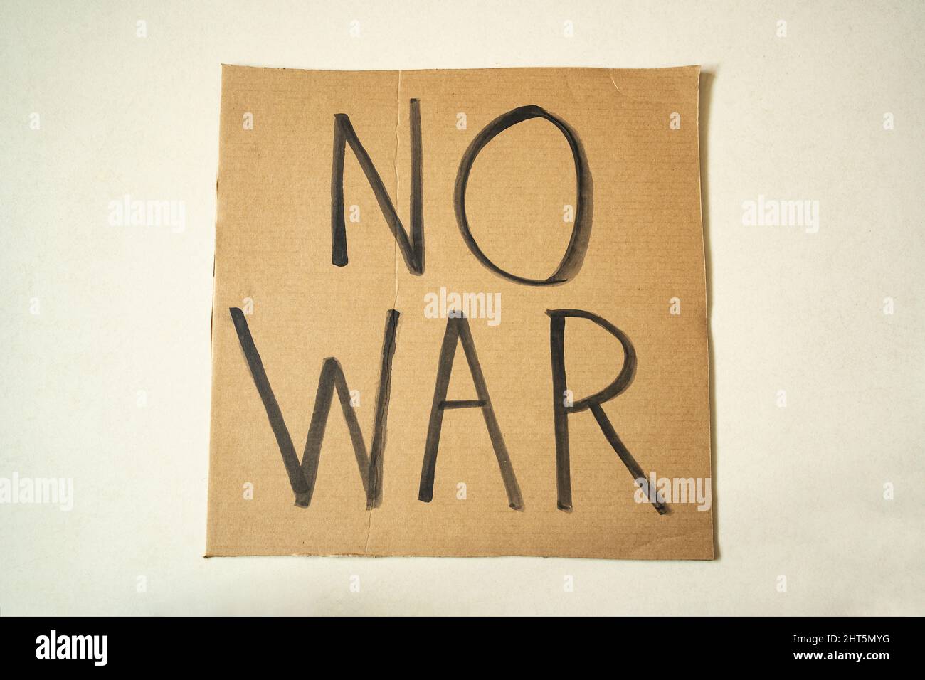 'No War' written on a cardboard Stock Photo