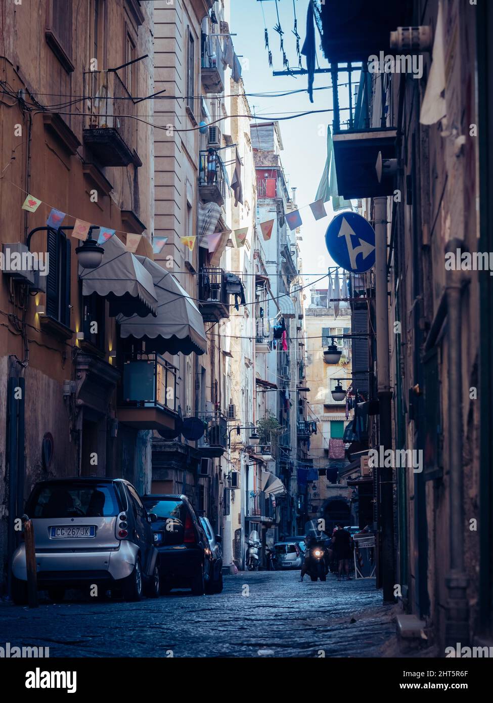 Vertical shot of a narrow street in Italy Stock Photo - Alamy
