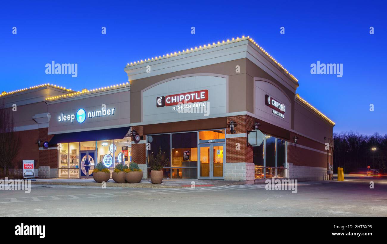 New Hartford, New York - Feb 24, 2022: Wide View of Chipotle Mexican Grill and Sleep Number Store in New Hartford Consumer Square. Stock Photo