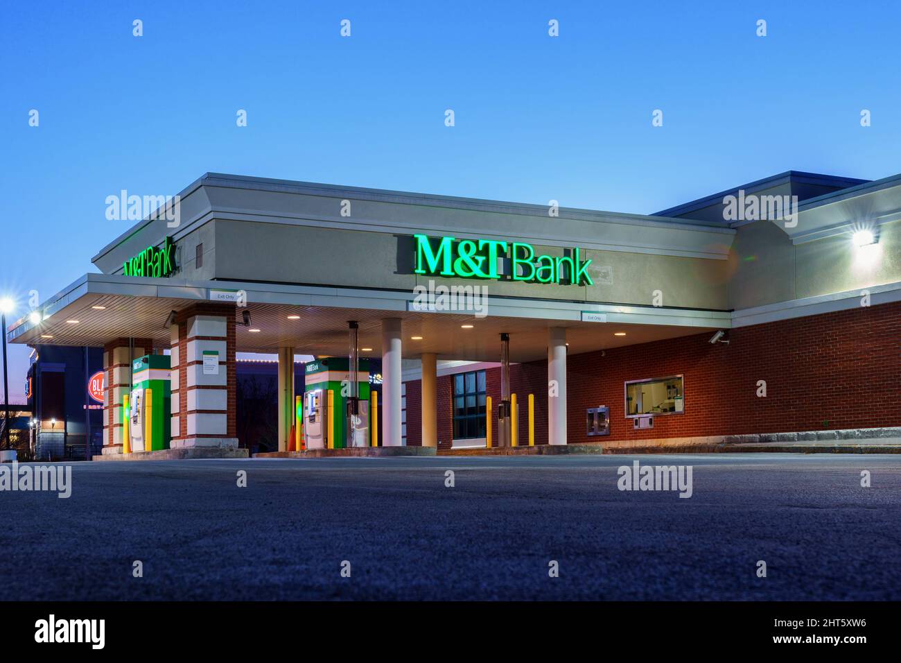 New Hartford, New York - Feb 24, 2022: Wide Night View of M&T Bank Building Drive Thru. M&T Bank Corporation is an American bank holding co. headquart Stock Photo