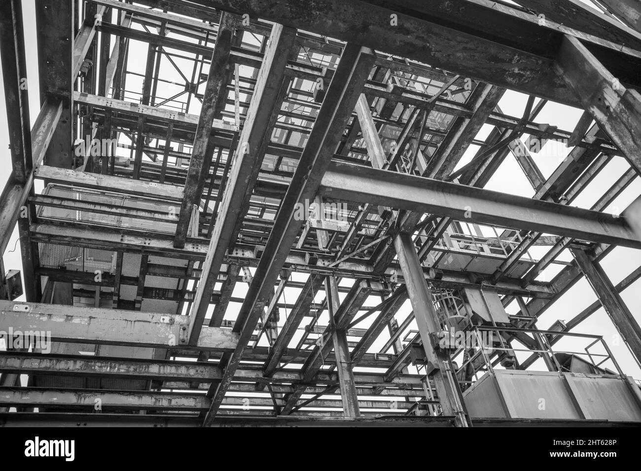 Low angle of a metal structure in an industrial site Stock Photo