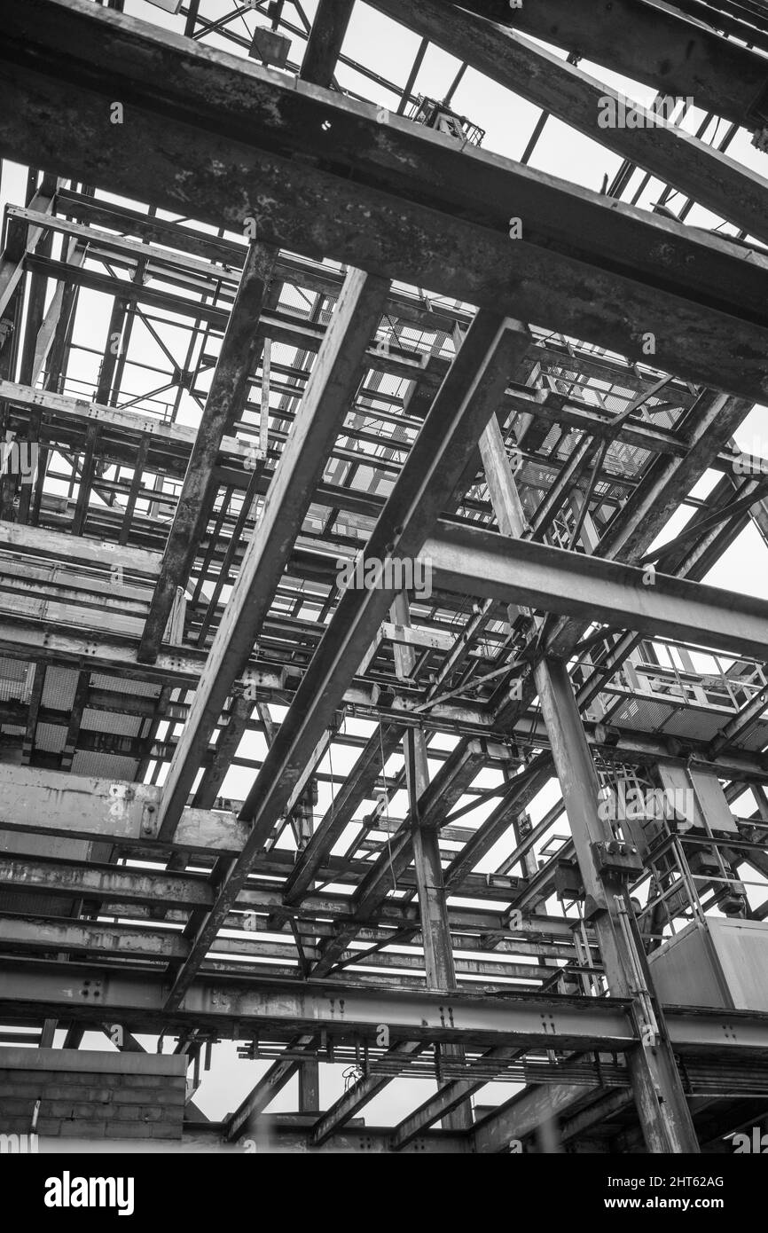 Low angle of a metal structure in an industrial site Stock Photo
