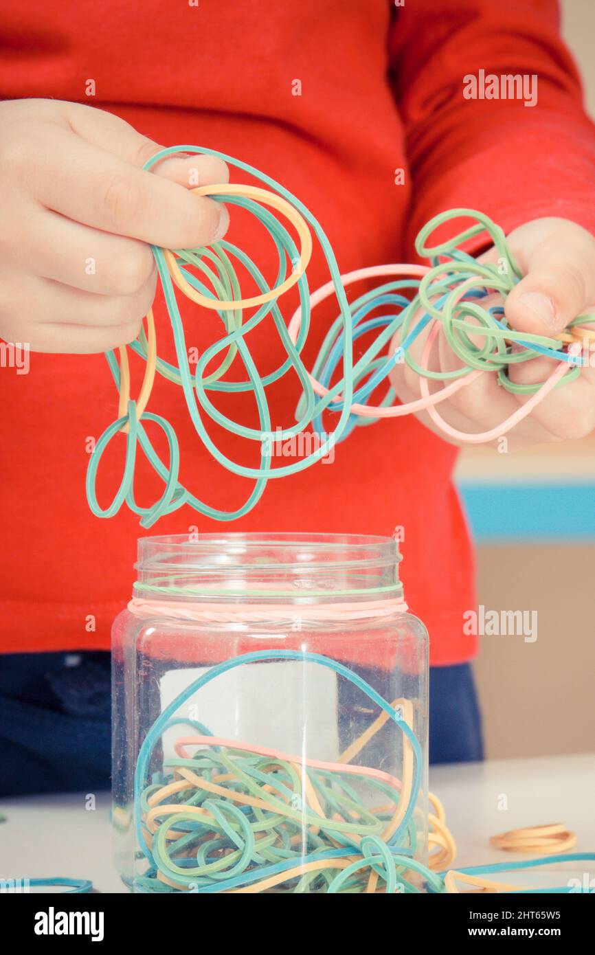preschooler-playing-with-colorful-rubber-erasers-best-creative-game
