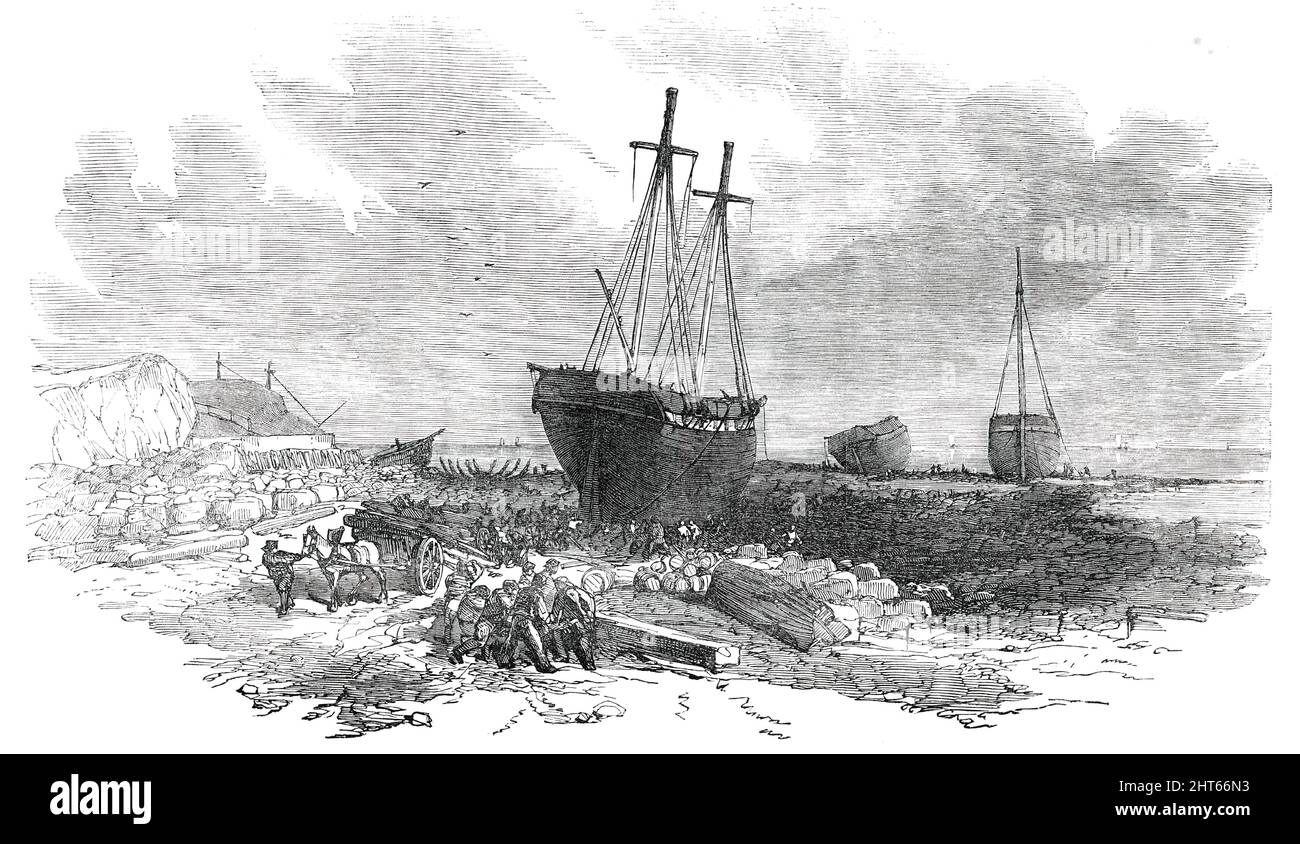 Wrecks on the Rocks at Tynemouth [North Shields] - sketched from below the Spanish Battery, 1850. '...the wind increased into a gale, the sea running high...a Hanoverian galliott, the Luna, laden with grain, missed her helm, and ran on to the rocks at Tynemouth, under the Spanish Battery. The Minuet, a Swede, ran on the Black Middens about the same time. The Vigilant schooner followed her, and now lies with her bottom knocked out. At 4 p.m. the Mary Anne, of North Shields, a laden collier [coal ship], likewise struck on the rocks...such a smashing and crashing, and tearing away of yards and sp Stock Photo
