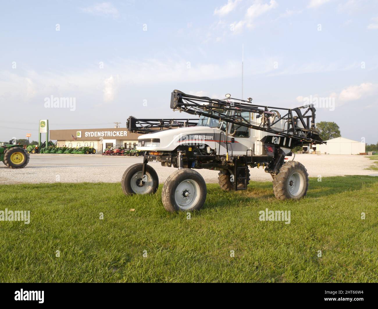 Agricultural chemical sprayer for sale at a farm implement store in