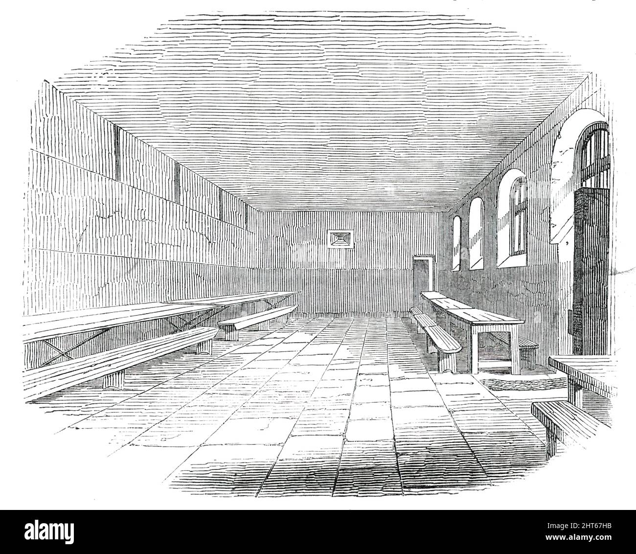 Dining Ward, Newgate Prison, [London], 1850. Extract from a report of the State of the Prison: 'The great corruption of Newgate still appears to be most fearful in the transport wards. The condition of the transports [those waiting to be 'transported' to penal colonies], confined for months in perfect idleness, makes them spend their leisure time in awfully corrupting one another. The language, acts, and habits of these utterly depraved men; their filthiness, falsehood, and pernicious animosities; are too bad to be described. The magistrates wish these men removed to their proper place of conf Stock Photo