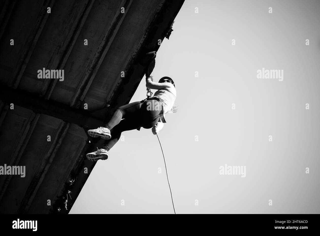 Woman Ralphing Salvador, Bahia, Brazil - Setembro 17, 2019: Woman practicing rappel on ...