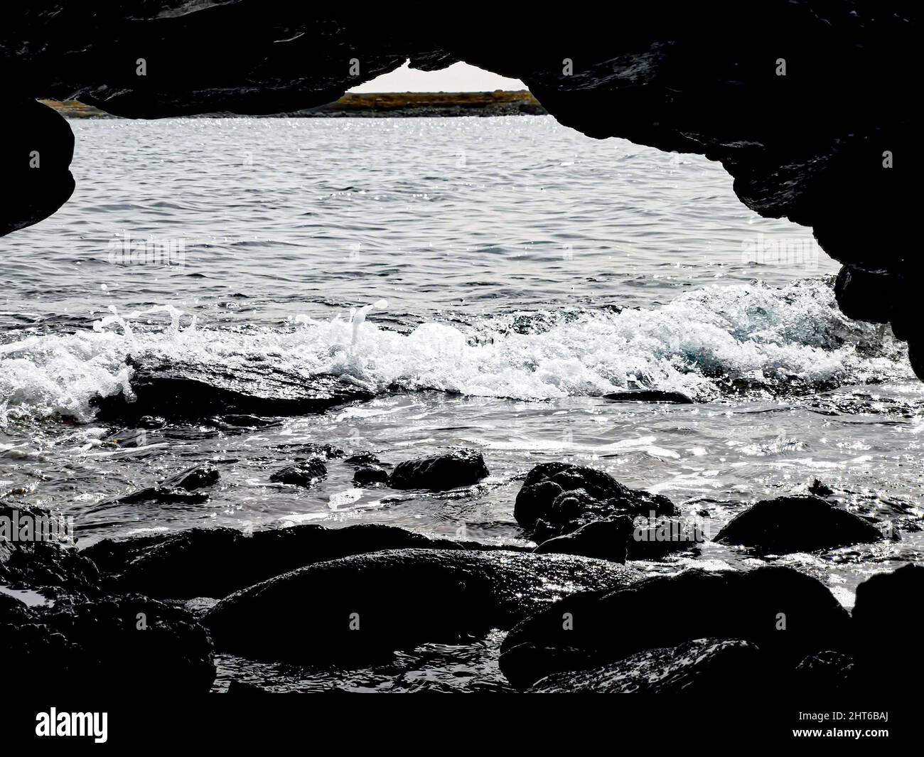 Natural view of strong waves splashing on the rocks in Cape Verde in ...