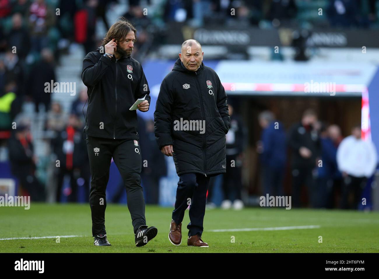 London, UK. 26th Feb, 2022. Eddie Jones, the head coach of England (r) looks on ahead of the game. Guinness Six Nations championship 2022 match, England v Wales at Twickenham Stadium in London on Saturday 26th February 2022. pic by Andrew Orchard/Andrew Orchard sports photography/ Alamy Live News Credit: Andrew Orchard sports photography/Alamy Live News Stock Photo