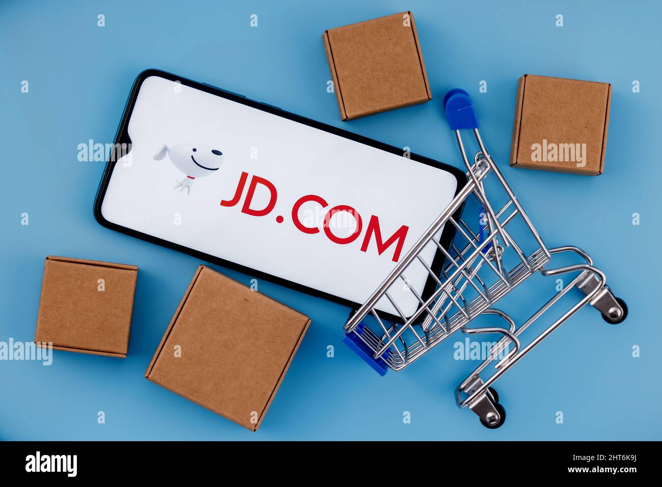 Shopee is e-commerce technology company. Smartphone with Shopee logo on the  screen, shopping cart and parcels Stock Photo - Alamy