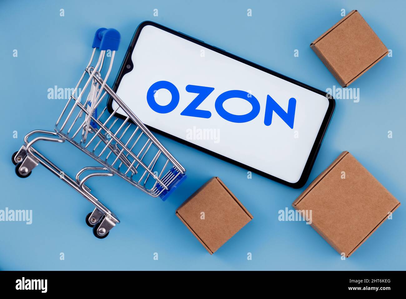 Ozon is Russian company. Smartphone with Ozon logo on the