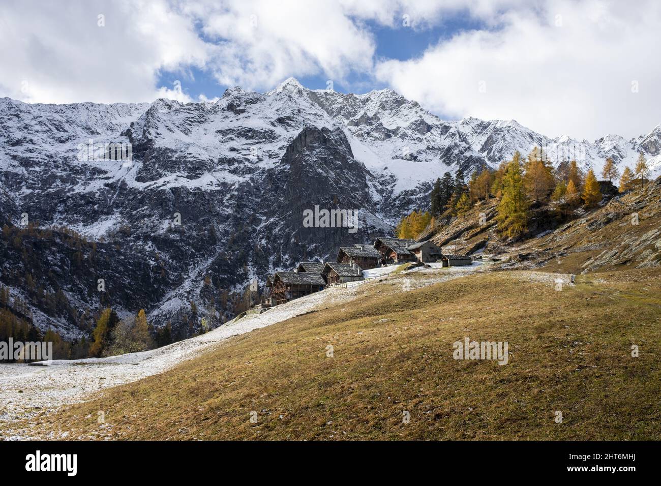 Alpine landscape with traditional wooden houses Stock Photo - Alamy