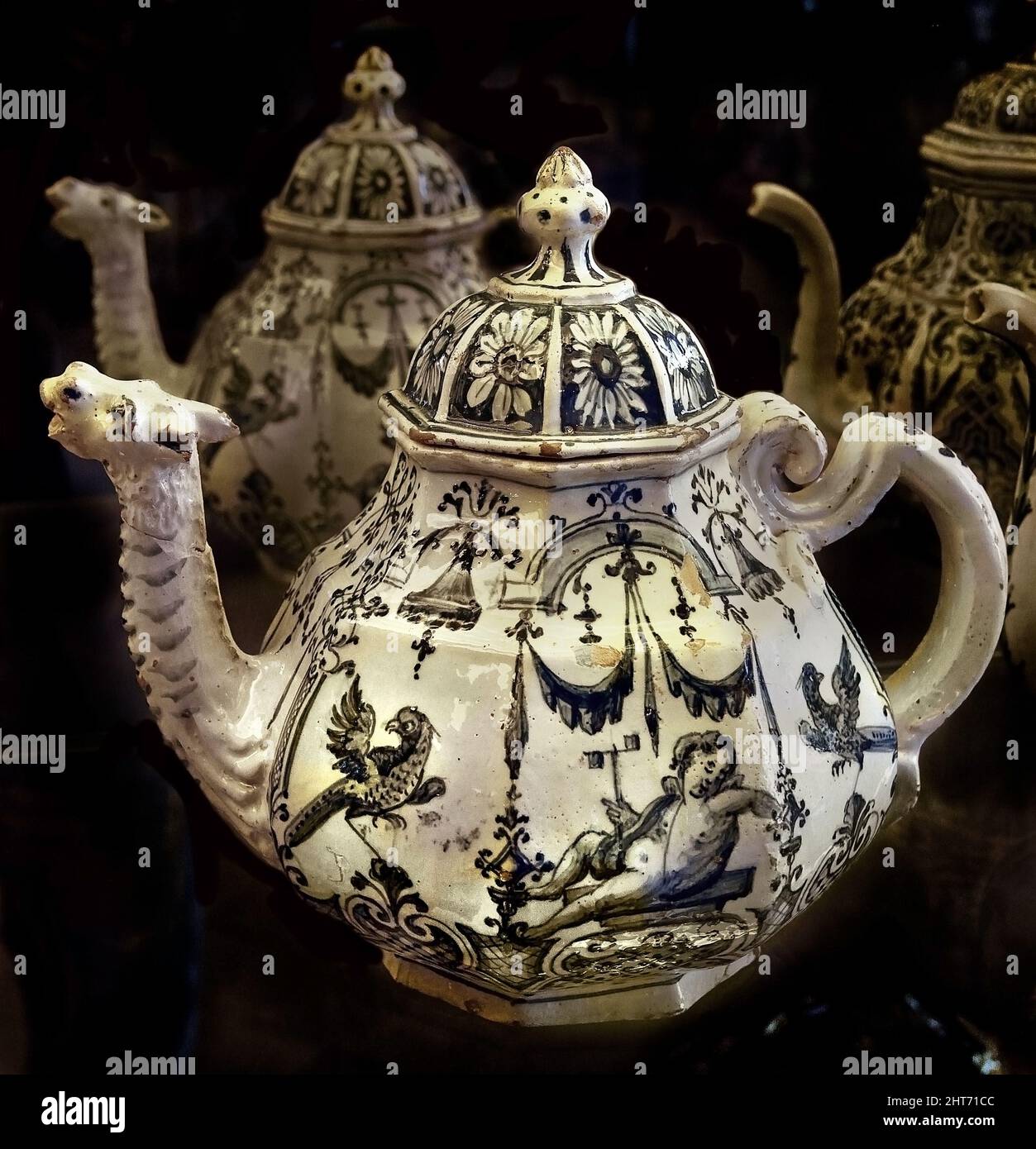 https://c8.alamy.com/comp/2HT71CC/caffettiera-coffee-maker-by-dono-dazeglio-1874-palazzo-madama-casaforte-degli-acaja-palace-in-turin-italy-italian-teiere-teapots-%60alla-berain%60-1740-faenza-ferniani-regoli-palazzo-madama-the-most-ancient-building-in-turin-is-right-in-the-city-centre-having-played-a-leading-role-in-its-history-from-roman-times-through-to-the-present-day-it-was-declared-a-world-heritage-site-with-the-other-residences-of-the-house-of-savoy-in-1997-2HT71CC.jpg