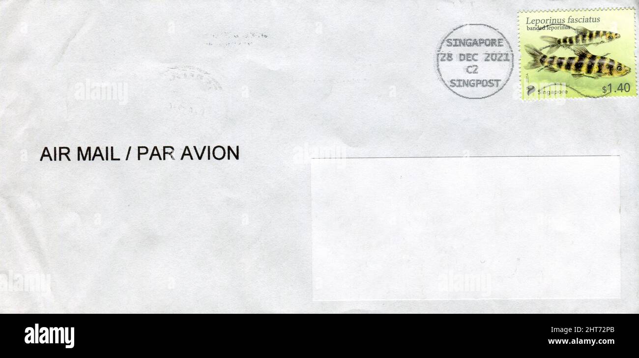 Old envelope which was dispatched from Singapore to Gomel, Belarus, December 28, 2021. Stock Photo