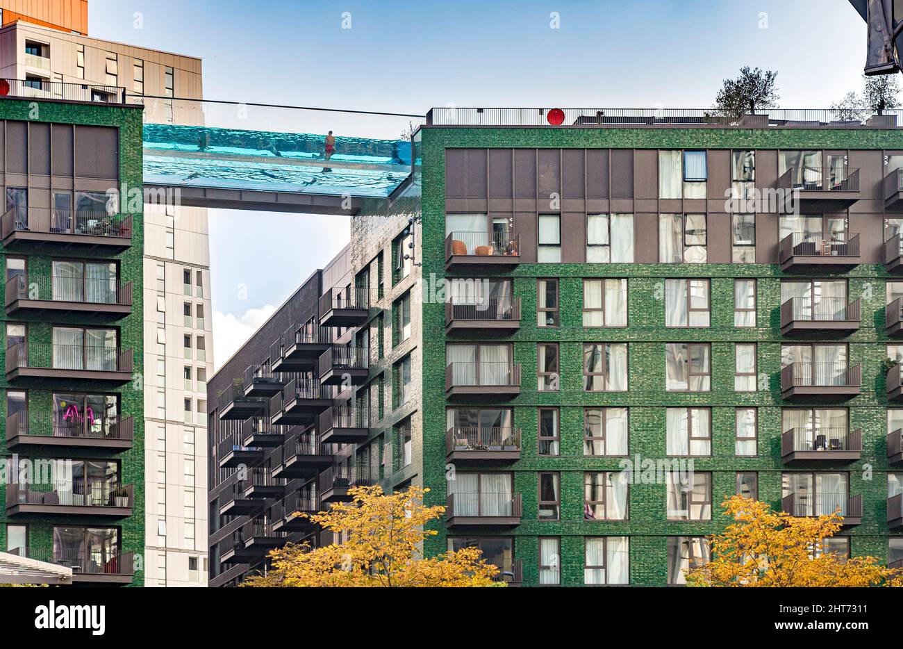 Nine elms swimming pool between buildings hi-res stock photography and
