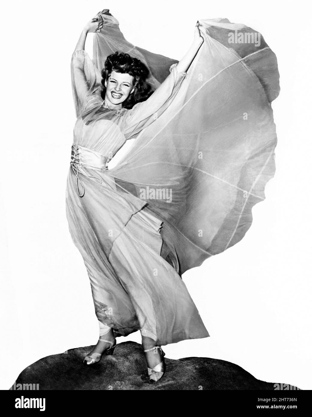 RITA HAYWORTH in COVER GIRL (1944), directed by CHARLES VIDOR. Credit