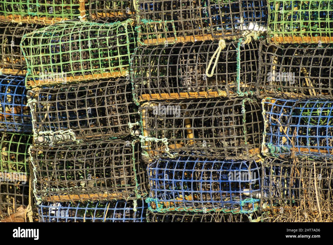 Colorful lobster trap on the quayside of the fishing port of Portimao Stock Photo Alamy