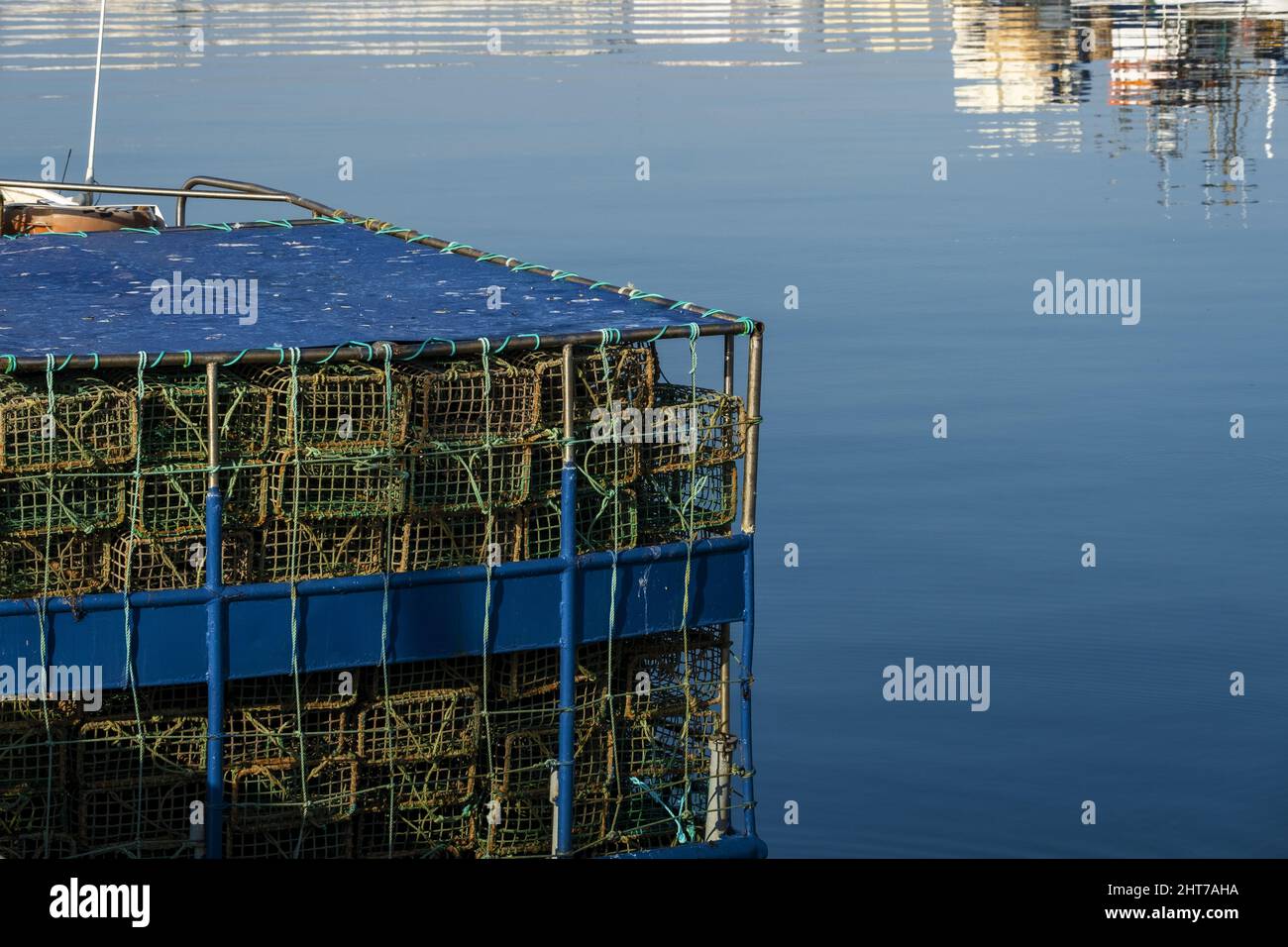 Colorful lobster trap on the quayside of the fishing port of Portimao