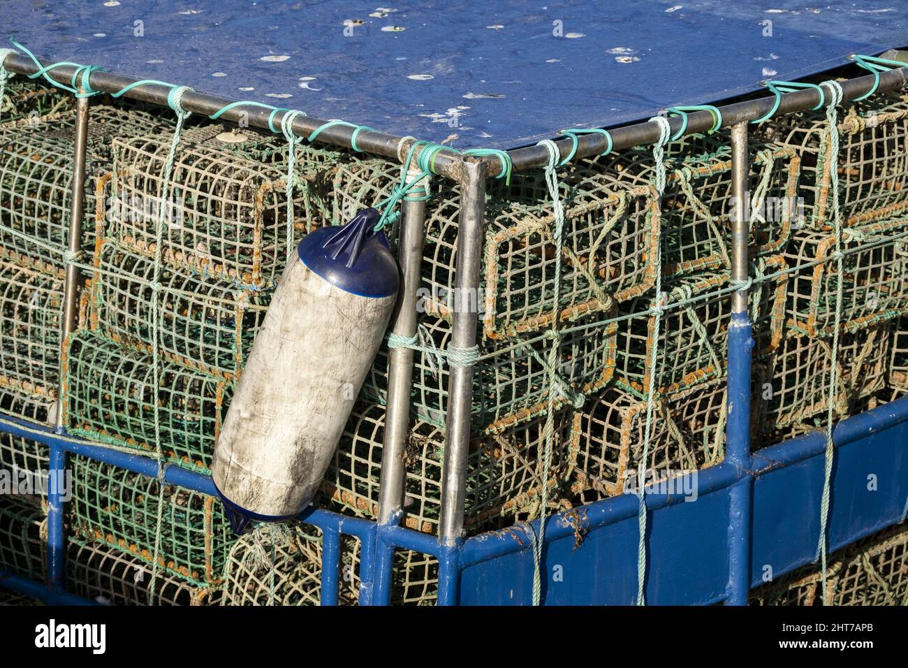 Colorful lobster trap on the quayside of the fishing port of Portimao