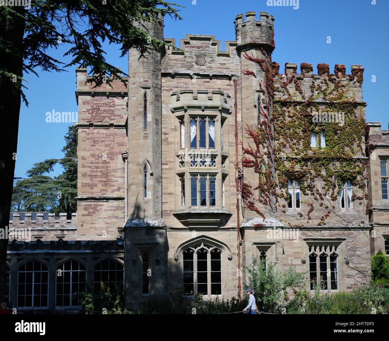 Beautiful view of an old castle with a garden under the blue sky Stock ...