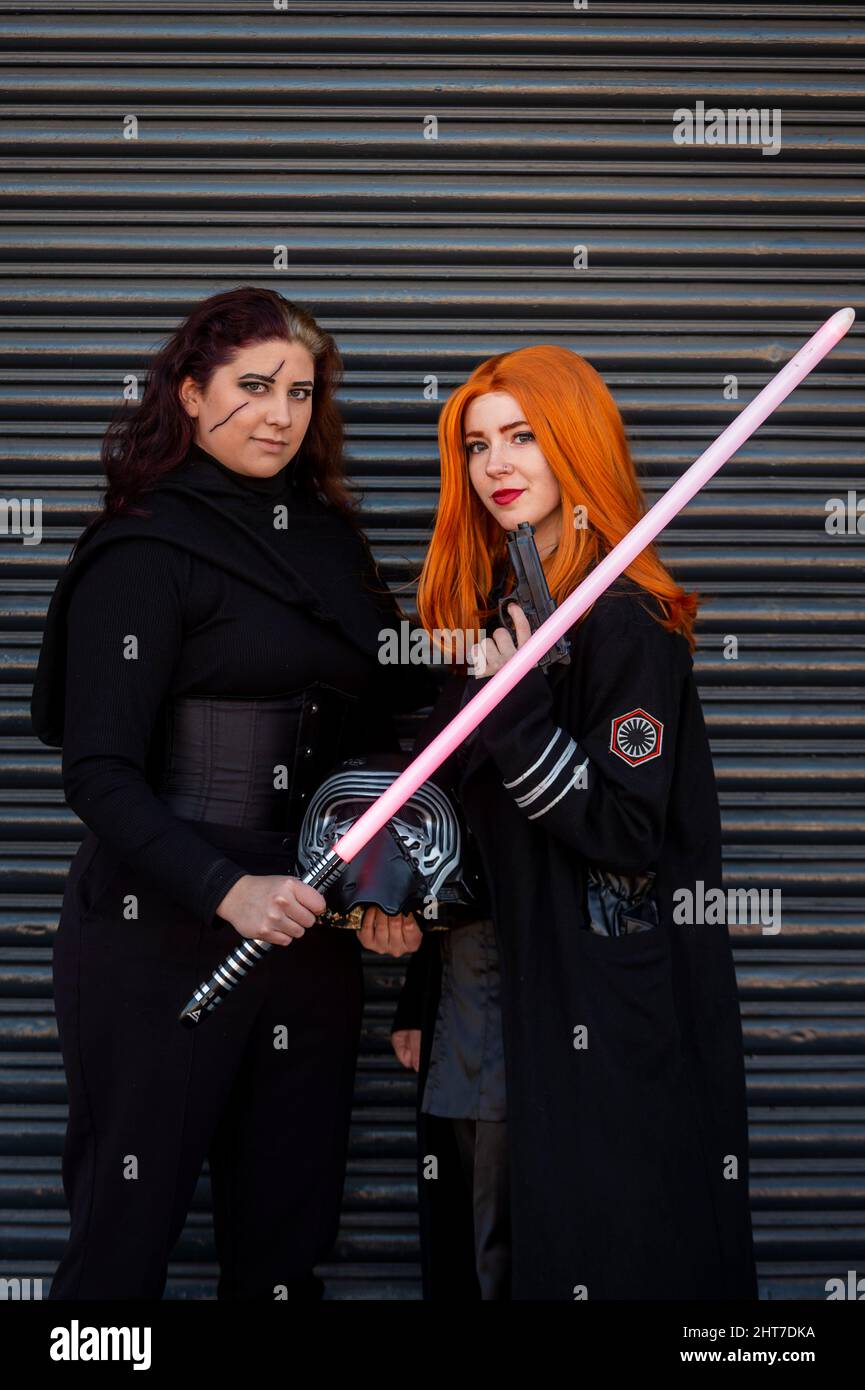 London, UK.  27 February 2022.  Women dressed as Kylo Ren and General Hux from Star Wars arrive at London Comic Con Spring held in Kensington Olympia.  The festival celebrates comics, film and TV.  Credit: Stephen Chung / Alamy Live News Stock Photo
