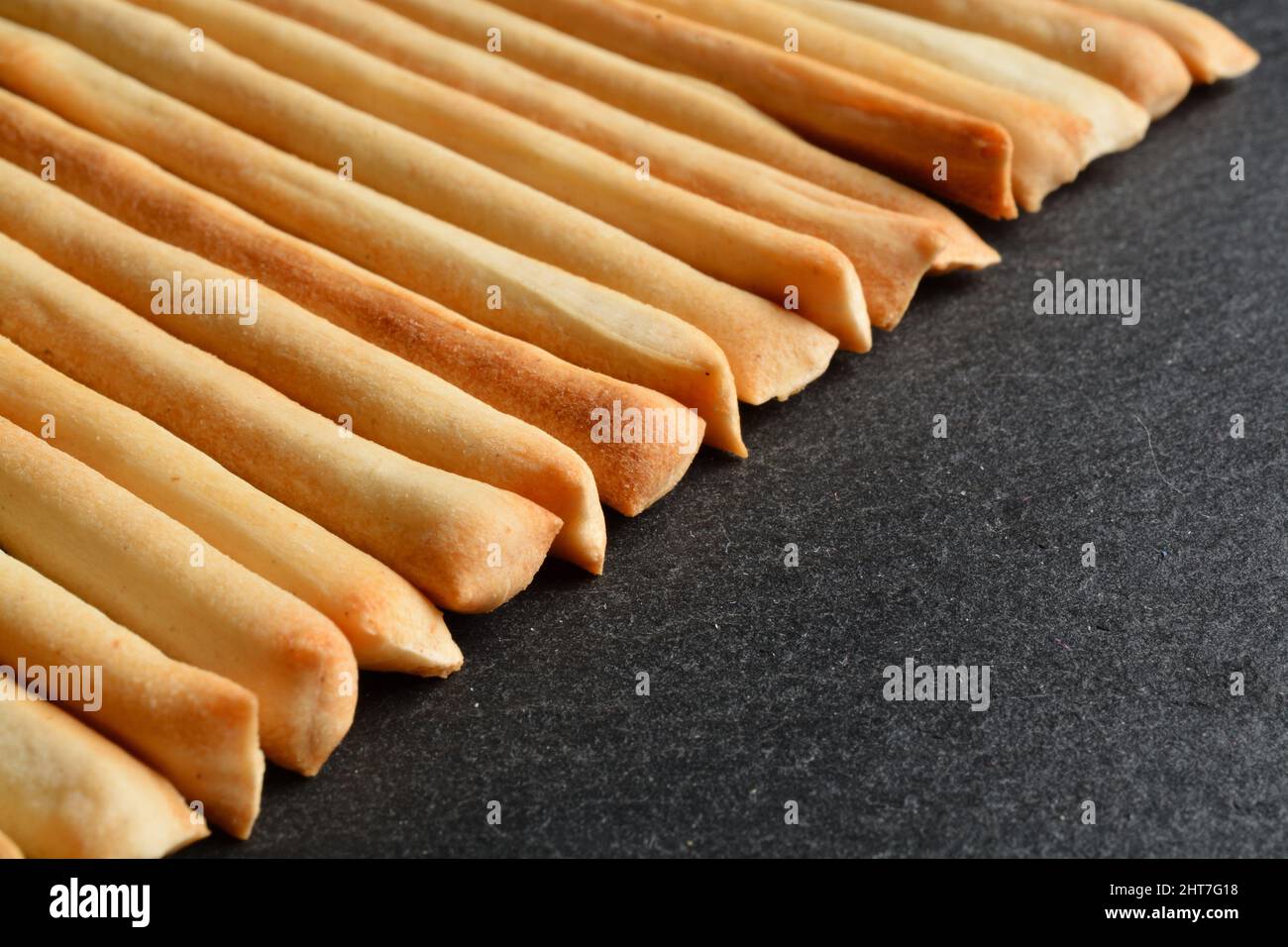 Thin breadsticks called Grissini Torinesi. Shallow depth of field Stock Photo Alamy