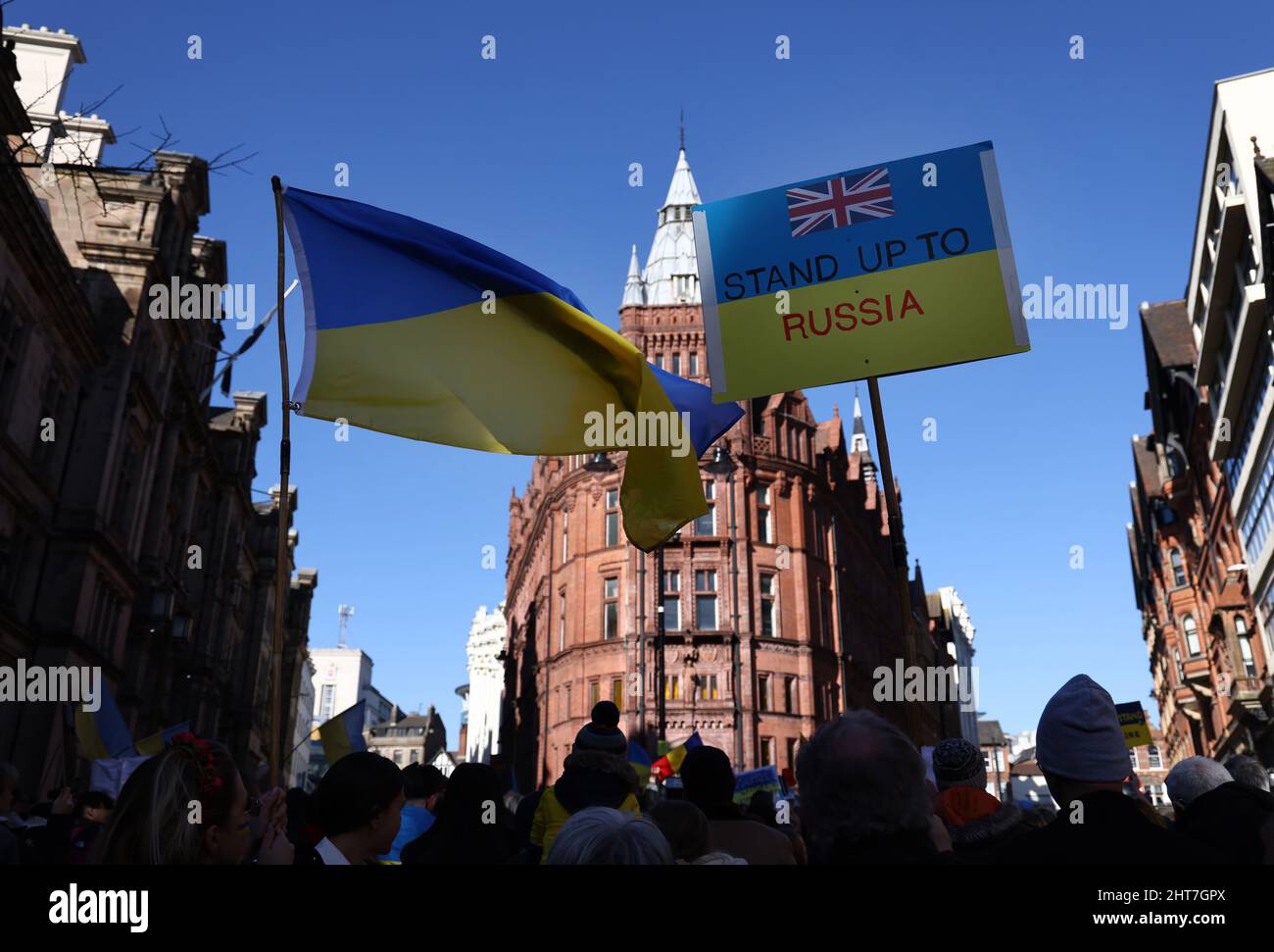 Nottingham, Nottinghamshire, UK. 27th February 2022. Demonstrators attend a vigil after Russian President Vladimir Putin ordered the invasion of Ukraine. Hundreds of people gathered in Old Market Square to show support to Ukrainian people. Credit Darren Staples/Alamy Live News. Stock Photo