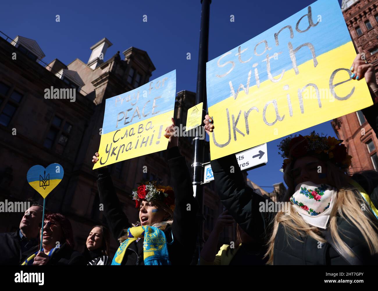 Nottingham, Nottinghamshire, UK. 27th February 2022. Demonstrators attend a vigil after Russian President Vladimir Putin ordered the invasion of Ukraine. Hundreds of people gathered in Old Market Square to show support to Ukrainian people. Credit Darren Staples/Alamy Live News. Stock Photo