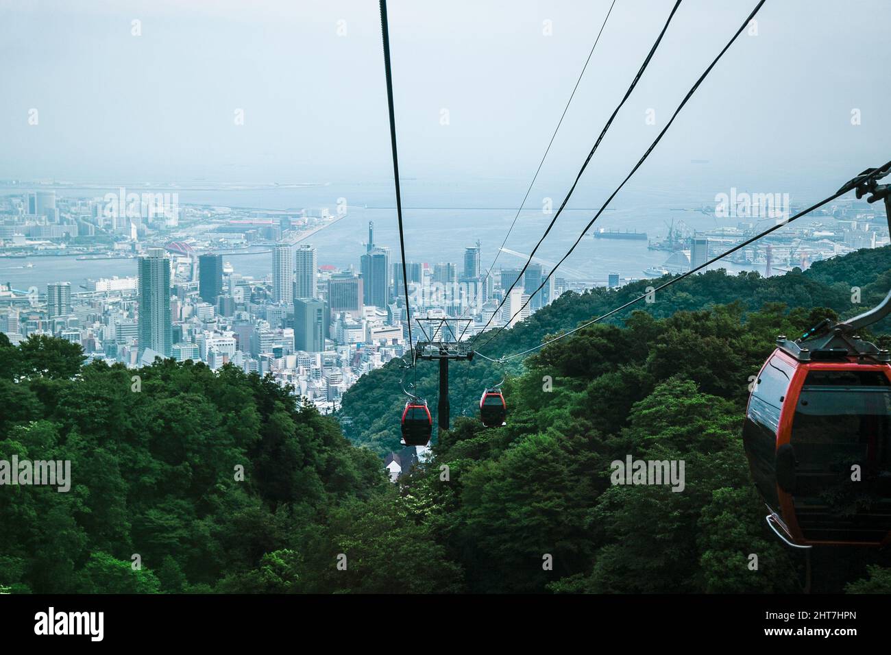 Low angle shot of cable cars over Kobe, Kansai, Japan Stock Photo Alamy