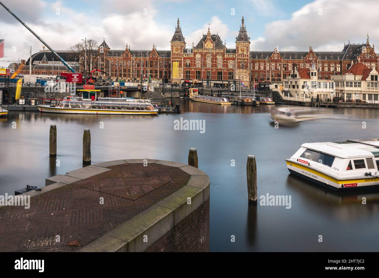 Boat jetty for canal cruises at Central Station, Centraal, Amsterdam, Netherlands, Europe Stock Photo
