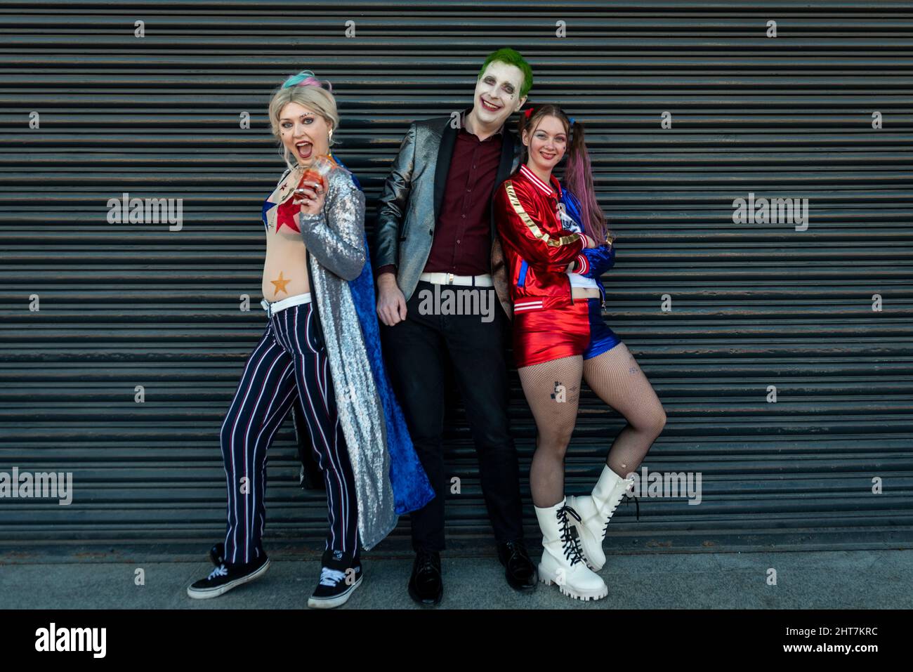 London, UK.  27 February 2022.  People dressed as Harley Quinn and The Joker, DC comics characters, arrive at London Comic Con Spring held in Kensington Olympia.  The festival celebrates comics, film and TV.  Credit: Stephen Chung / Alamy Live News Stock Photo