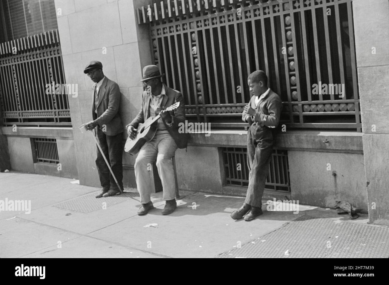 Marion Post Wolcott - Beggars on Main Street Corner, Montgomery Alabama, USA - 1939 Stock Photo