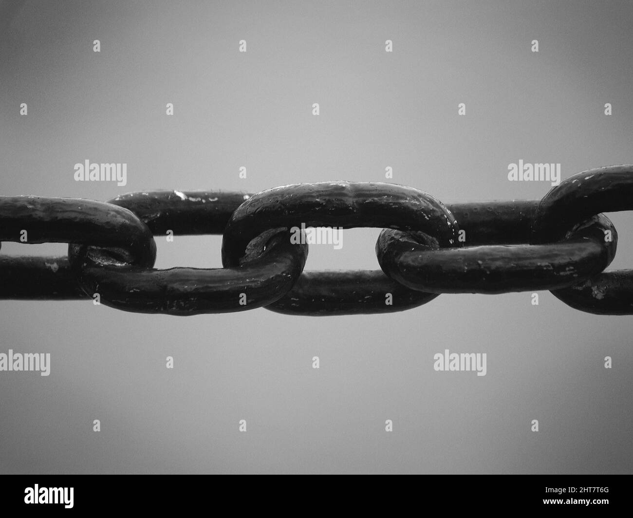 A grayscale view of a grungy chain Stock Photo